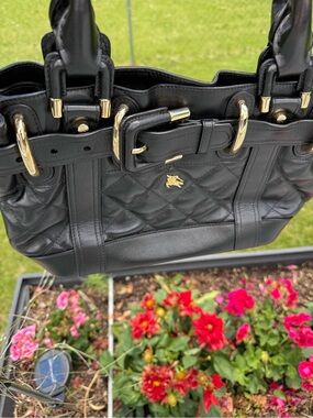 Burberry prosrum authentic Black Quilted Leather Tote Handbag with Gold accents
